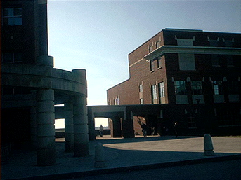 The Syracuse University College of Law at dusk.